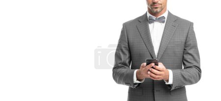 cropped man in blue bow tie suit chat on phone isolated on white. with copy space.