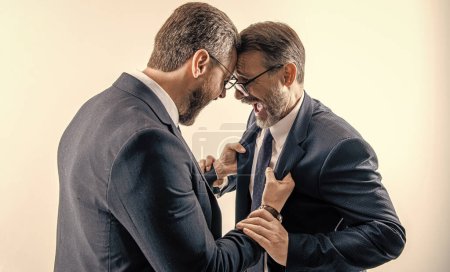 rival company threatening. businessmen threaten business men isolated on white. historic rivalry. businessmen threaten business model. men having conflict. threatening business reputation.