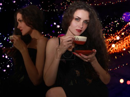 Photo for Young woman with cup of coffee - Royalty Free Image