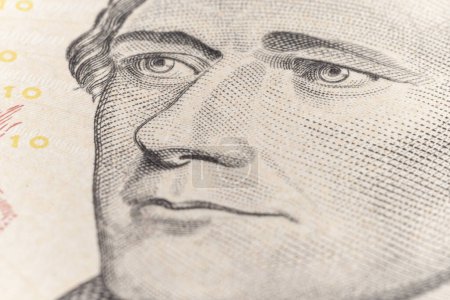 Téléchargez les photos : Dix dollars de facture à peu près. fragmentez macro. Portrait du président Alexander Hamilton - en image libre de droit