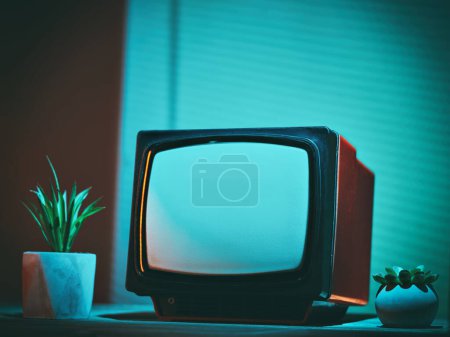 Photo for Retro Red TV on Table - Royalty Free Image