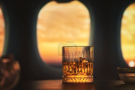 Photo for Luxurious whiskey, sunset skyward flight - Royalty Free Image