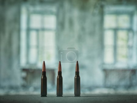 Photo for Three bullets inside a ruined building - Royalty Free Image