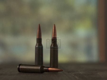 Photo for Bullets arranged on table surface - Royalty Free Image