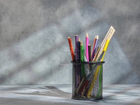 Photo for Black pencil case with pens - Royalty Free Image