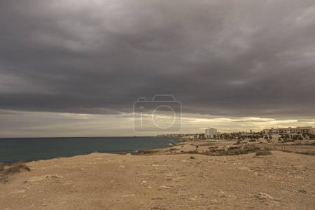 Photo for Stormy sky on La Zenia beach in Alicante. Spain. - Royalty Free Image