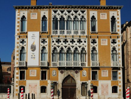 Photo for Facade Of The Venetian Renaissance Style Palazzo Franchetti On The Canale Grande In Venice Italy On A Wonderful Spring Day With A Clear Blue Sky - Royalty Free Image