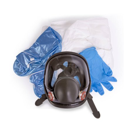 Photo for Top view of pollution protection suit , full face mask, clothing, gloves and shoes on white background. - Royalty Free Image