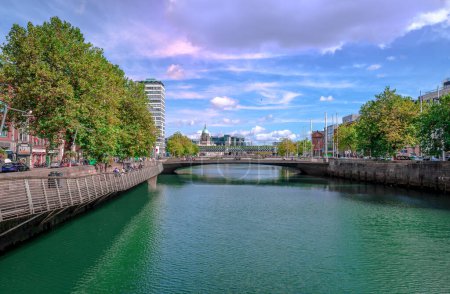 Photo for Dublin, Ireland - September 16 2022: The Dublin quays that run along the north and south banks of the River Liffey with Rosie Hackett bridge in the background. Picture taken from O'Connell bridge. - Royalty Free Image