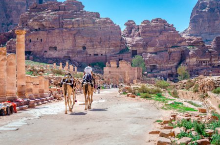 Photo for Petra, Jordan - April 16 2023: The Colonnade Street that runs through the center of of the Ancient City, with many unexcavated sites on either side and the temple of Qasr al-Bint (Dushares) up front. - Royalty Free Image