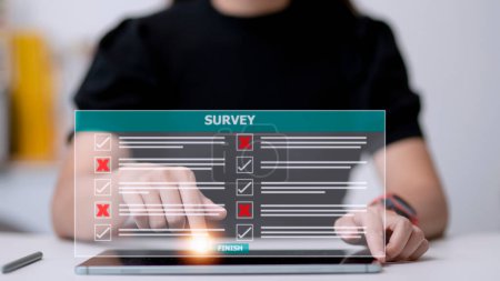 Foto de Survey form concept. Check marks on checklist and Filling online form or answering questions. Customer Experiences and satisfaction concept. - Imagen libre de derechos