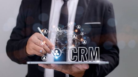 Foto de CRM Customer Relationship Management for business sales marketing system concept presented in futuristic graphic interfaz of service application to support CRM database analysis. - Imagen libre de derechos