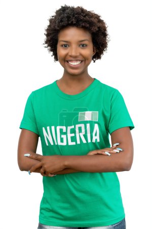 Photo for Beautiful football fan from Nigeria with green jersey isolated on white background for cut out - Royalty Free Image