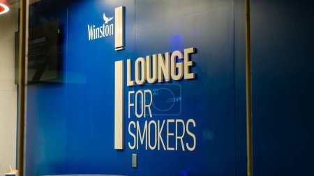 Photo for Muscat, oman-November 21,2023 : winston lounge for smokers at muscat airport - Royalty Free Image
