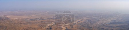 Photo for View of Jabal Samhan with majestic mountain range that offers a breathtaking escape into the heart of Oman's wilderness. - Royalty Free Image
