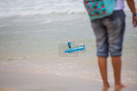 Photo for Boat with offerings to iemanja, during a party at copacabana beach. - Royalty Free Image