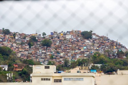 Photo for View from Rocinha Favela in Rio de Janeiro, Brazil - November 07, 2022: Rocinha Favela seen from Gavea neighborhood in Rio de Janeiro. - Royalty Free Image