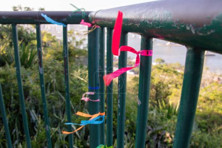 Ribbons attached to a railing at the Penha Convent in Espirito Santo, Brazil.