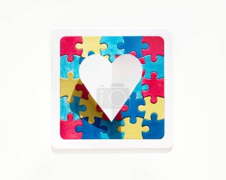 Photo for Autism Awareness Day, World Autism Day, frame with puzzle pieces and paper hearts. Banner, wallpaper, background for flyer, poster for Health Care Awareness campaign for Autism - Royalty Free Image