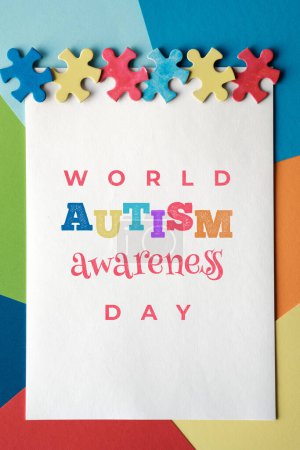 Photo for Autism Awareness Day April 2, World Autism Day, frame with puzzle pieces. Banner, wallpaper, background for flyer, poster for Health Care Awareness campaign for Autism - Royalty Free Image