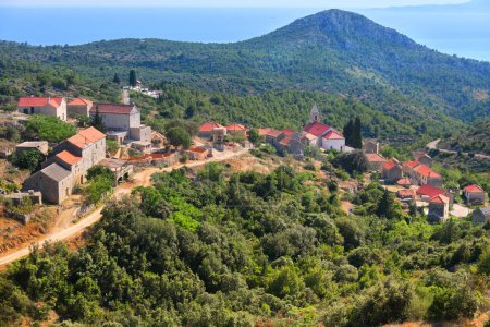 Photo for Bird view of Velo Grablje. Historic village on Hvar island in Croatia famous for lavender, red vine and olive oil production. Aerial view from an old mountain road. - Royalty Free Image