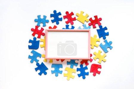 Photo for Autism Awareness Day, World Autism Day, frame with puzzle pieces. Banner, wallpaper, background for flyer, poster for Health Care Awareness campaign for Autism - Royalty Free Image