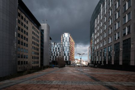 Photo for BRUSSELS, BELGIUM - FBERUARY 25, 2023: EU headquarters, European commission, offices of European Union in Brussels under stormy dark dramatic sky. - Royalty Free Image