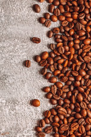 Photo for Spilled coffee beans on the table. - Royalty Free Image