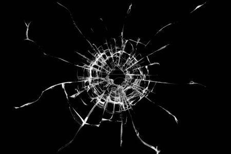 Photo for Broken hole in glass black background. - Royalty Free Image