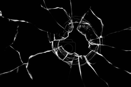 Foto de Cristales rotos de una bala. Textura de vidrio roto. - Imagen libre de derechos