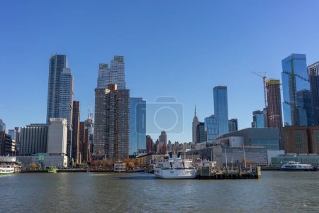 Photo for Manhattan, New York - November 26 2022: view of Manhattan skyline from Hudson river,New York. Manhattan has been described as the cultural, financial, media, and entertainment capital of the world - Royalty Free Image