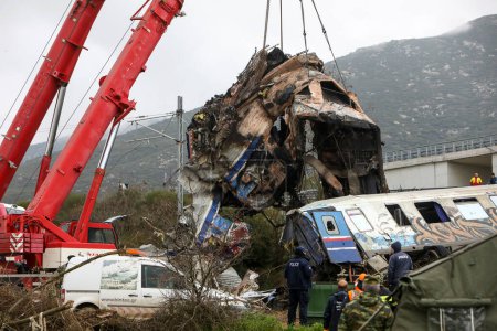 Photo for Tempi Valley, Greece - March 2, 2023: Tempi Valley, Greece - March 1, 2023: A tragic accident occurred in northern Greece, as two trains collided in the Tempi Valley. rescuers search the wreckage for survivors - Royalty Free Image