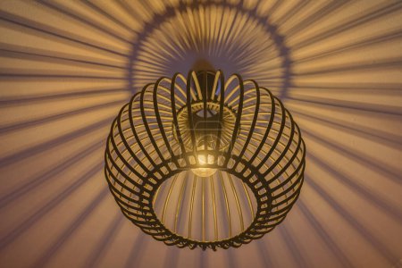 Modern handmade circular bamboo ceiling lamp. lighting bulbs for office building or home and living room decoration. Light effect
