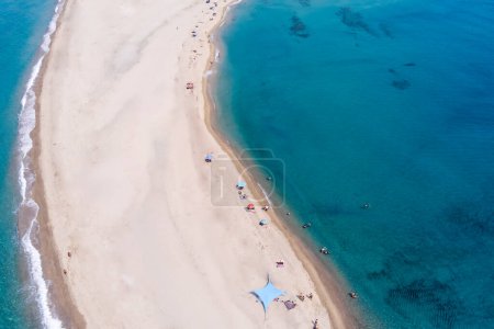 Aerial view of exotic sandy peninsula and sandy beach of Posidi with turquoise clear sea, Kassandra, Chalkidiki, North Greece