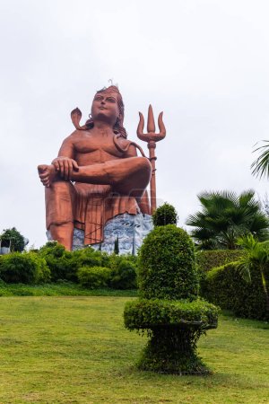 Photo for Hindu god lord shiva with shivalinga isolated statue with bright background at morning image is taken at statue of belief nathdwara rajasthan india. - Royalty Free Image