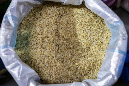 Photo for Parboiled rice or boiled rice for sale at retail shop from top angle at day - Royalty Free Image