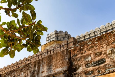 ancient fort stone wall with bright blue sky at morning image is taken at Kumbhal fort kumbhalgarh rajasthan india.