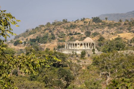 isolated temple situated in the middle of forests at morning from flat angle image is taken at Kumbhal fort kumbhalgarh rajasthan india.