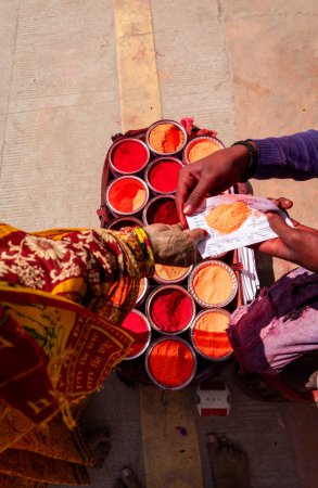 colorful vermilion kept for selling at holy place at street shop at morning