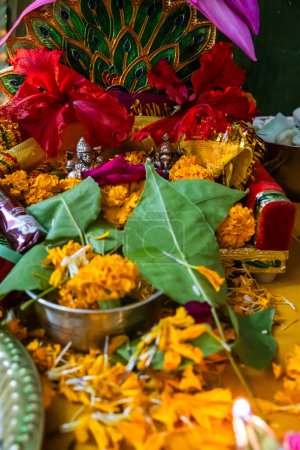 holy hindu god worship with flowers at durga pooja festival at night from different angle
