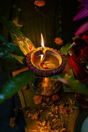 holy hindu offerings pot or Kalasha on the occasion of diwali festival at night