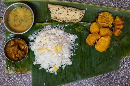 indian traditional launch served at banana leaf at home form top angle