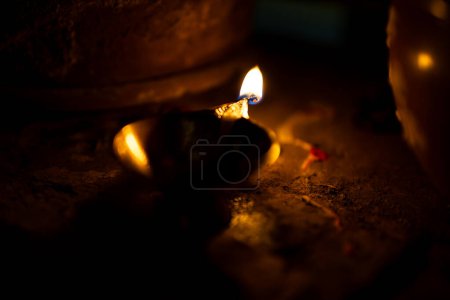 holy copper oil lamp burning at home offerings for almighty god at night