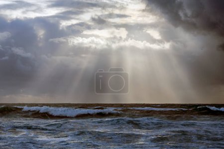 Photo for Autumn cloudy seascape with sunbeams, northern portuguese coast. - Royalty Free Image