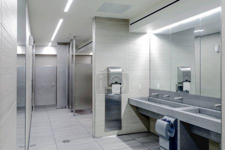 urinals in public restroom for men