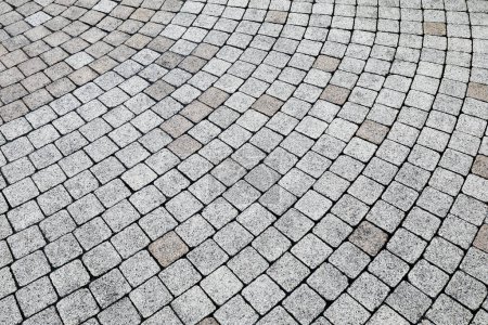 area paved with stone blocks in a circular pattern