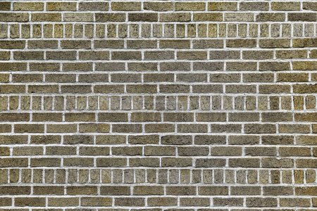 Téléchargez les photos : Le fond du vieux mur de briques jaunes - en image libre de droit