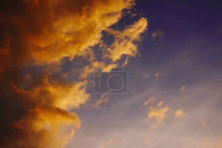 Photo for Blur focus Sunset sky yellow clouds on a blue sky  background - Royalty Free Image