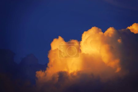 Photo for Blur focus Sunset sky yellow clouds on a blue sky  background - Royalty Free Image
