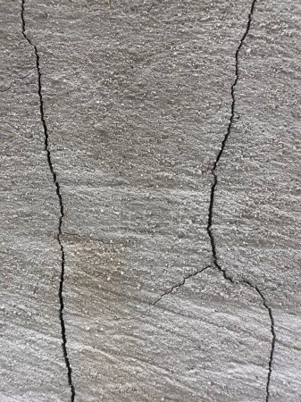 Photo for Cracked concrete wall in house building, suitable for your design and work surface. - Royalty Free Image